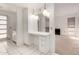 Vanity area with a mirror and three drawers at 9719 W Newport Dr, Sun City, AZ 85351