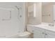 Clean bathroom with a shower/tub combo, vanity, and storage at 10450 W Campana Dr, Sun City, AZ 85351