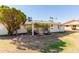 View of back of house with patio and landscaping at 10450 W Campana Dr, Sun City, AZ 85351