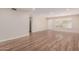 Open concept living room with hardwood floors and lots of natural light at 10450 W Campana Dr, Sun City, AZ 85351