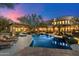 Serene backyard featuring a pool, lounge chairs, desert landscaping, and mountain views at 10801 E Happy Valley Rd # 102, Scottsdale, AZ 85255