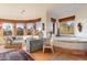Bathroom with tiled vanity, lounge chair, and outdoor views at 10801 E Happy Valley Rd # 102, Scottsdale, AZ 85255