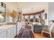 A spacious bathroom area with vanity, tub, and windows showcasing outdoor views at 10801 E Happy Valley Rd # 102, Scottsdale, AZ 85255