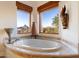 Inviting bathroom featuring bathtub with beautiful views at 10801 E Happy Valley Rd # 102, Scottsdale, AZ 85255