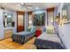 Charming bedroom featuring two twin beds, cool color scheme, and natural light at 10801 E Happy Valley Rd # 102, Scottsdale, AZ 85255