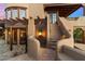 The house showcases beautiful architectural design elements and a grand staircase at 10801 E Happy Valley Rd # 102, Scottsdale, AZ 85255