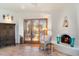 Comfortable living room with a fireplace, natural light, and Southwestern decor at 10801 E Happy Valley Rd # 102, Scottsdale, AZ 85255