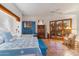The main bedroom features access to a private balcony and a blue and white color scheme at 10801 E Happy Valley Rd # 102, Scottsdale, AZ 85255