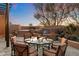 Inviting outdoor dining area with seating for six, featuring a water feature, perfect for enjoying meals al fresco at 10801 E Happy Valley Rd # 102, Scottsdale, AZ 85255