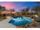 Beautiful backyard pool with cacti and desert landscaping at 10801 E Happy Valley Rd # 102, Scottsdale, AZ 85255