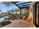 Relaxing outdoor living space with a pool, lounge chairs, and built in seating perfect for entertaining and enjoying the scenery at 10801 E Happy Valley Rd # 102, Scottsdale, AZ 85255