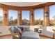 Cozy sitting area with large picture windows offers panoramic views of the surrounding desert landscape at 10801 E Happy Valley Rd # 102, Scottsdale, AZ 85255