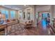 Cozy living room with hardwood floors, neutral color palette, and great natural light throughout the space at 12780 W Desert Vista Trl, Peoria, AZ 85383