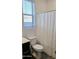 Clean bathroom with shower/tub combo, toilet, and vanity at 1629 W Buist Ave, Phoenix, AZ 85041