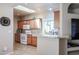 Modern kitchen with granite countertops and wood cabinets at 17200 W Bell Rd # 873, Surprise, AZ 85374