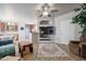 Open living room with view into kitchen and dining area at 17200 W Bell Rd # 873, Surprise, AZ 85374