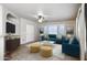 Bright living room with large windows, modern furniture, and stylish decor for comfortable and inviting space at 17200 W Bell Rd # 873, Surprise, AZ 85374