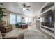 Open living room with view into kitchen and dining area at 17200 W Bell Rd # 873, Surprise, AZ 85374
