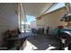 Covered patio with seating area and string lights at 17200 W Bell Rd # 873, Surprise, AZ 85374