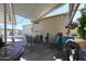 Covered patio with seating area, grill, and fire pit at 17200 W Bell Rd # 873, Surprise, AZ 85374
