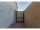 Backyard access through a gated entrance at 2038 E Dry Wood Rd, Phoenix, AZ 85024
