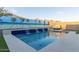 Relaxing square pool with waterfall features at 2038 E Dry Wood Rd, Phoenix, AZ 85024