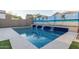 Refreshing backyard pool with waterfall features at 2038 E Dry Wood Rd, Phoenix, AZ 85024