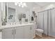 Bathroom with double vanity and shower/tub combo at 2038 E Dry Wood Rd, Phoenix, AZ 85024
