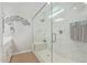 Large bathroom with a walk-in shower and marble tile at 2038 E Dry Wood Rd, Phoenix, AZ 85024