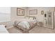 Small bedroom with a full-size bed and neutral decor at 2038 E Dry Wood Rd, Phoenix, AZ 85024