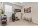 Home exercise room with elliptical and storage at 2038 E Dry Wood Rd, Phoenix, AZ 85024