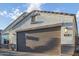 New construction home with a modern design and a two-car garage at 2038 E Dry Wood Rd, Phoenix, AZ 85024