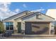 New construction home with a modern design and desert landscaping at 2038 E Dry Wood Rd, Phoenix, AZ 85024