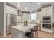 Modern kitchen with stainless steel appliances and white cabinetry at 2038 E Dry Wood Rd, Phoenix, AZ 85024