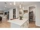 Kitchen island with view into pantry and living room at 2038 E Dry Wood Rd, Phoenix, AZ 85024