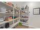 Well-organized pantry with ample shelving for storage at 2038 E Dry Wood Rd, Phoenix, AZ 85024
