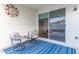 Relaxing patio with seating and access to backyard at 2038 E Dry Wood Rd, Phoenix, AZ 85024