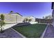 Spacious backyard featuring a grassy lawn and block wall at 2234 E 37Th Ave, Apache Junction, AZ 85119