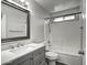 Bathroom with grey vanity, shower/tub combo, and mirror at 2234 E 37Th Ave, Apache Junction, AZ 85119