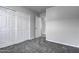 Bright bedroom with double door closet and grey carpet at 2234 E 37Th Ave, Apache Junction, AZ 85119