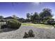 Landscaped common area with rock accents and trees at 2234 E 37Th Ave, Apache Junction, AZ 85119