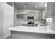 Modern kitchen with gray cabinets and white countertops at 2234 E 37Th Ave, Apache Junction, AZ 85119