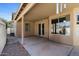 Spacious covered patio perfect for outdoor entertaining, with sliding glass door access to indoors at 2234 E Stephens Rd, Gilbert, AZ 85296