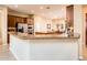 Island kitchen with granite countertops and stainless steel appliances at 22819 N Del Monte Dr, Sun City West, AZ 85375