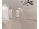 Neutral hallway featuring tile flooring, recessed lighting, and white doors at 2364 S Minneola Ln, Gilbert, AZ 85295