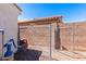 Chain link fence encloses a side yard with a gate at 29127 N Mountain View Rd, San Tan Valley, AZ 85143