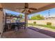 Covered patio with hot tub, grill, and fire pit, perfect for outdoor entertaining at 29127 N Mountain View Rd, San Tan Valley, AZ 85143
