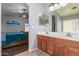Bathroom with double vanity and view of bedroom at 29127 N Mountain View Rd, San Tan Valley, AZ 85143