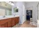 Double vanity bathroom with linen closet and shower at 29127 N Mountain View Rd, San Tan Valley, AZ 85143