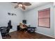 Home office with large desk and comfortable chair at 29127 N Mountain View Rd, San Tan Valley, AZ 85143